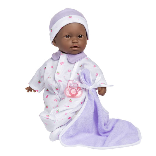 11" Soft Body Doll Dressed in Purple and Flower Print outfit. Doll is wearing a hat, and can use pictured pacifier and blanket